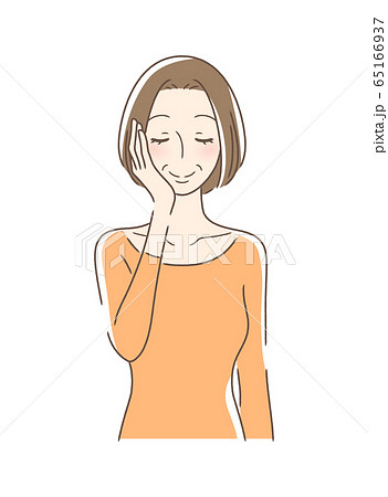 手の平で頬を触る女性 65166937