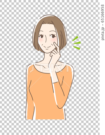 頬をつんつんして笑顔の女性 頬をつんつんして笑顔の女性 65166958