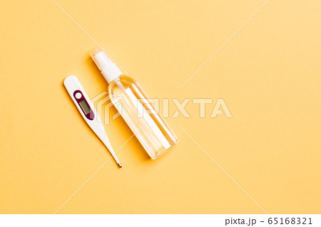 Top view of alcohol hand sanitizer and digital 65168321