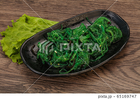 Green Chuka Seaweed Salad Isolated on White 65169747