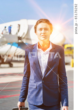 Portrait of young attractive flight attendant 65170292