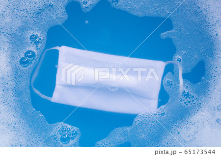Cloth mask soak in powder detergent water Cloth mask soak in powder detergent water 65173544