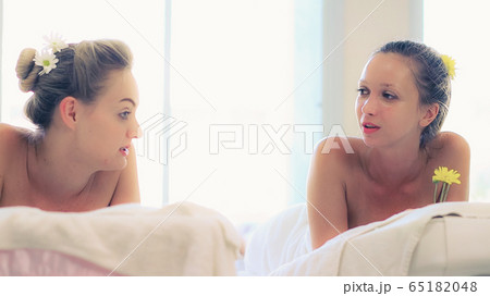 Two women at massage room in luxury day spa. Two women at massage room in luxury day spa. 65182048