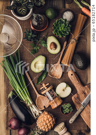 Fresh organic ingredients for salad making on rustic background Fresh organic ingredients for salad making on rustic background 65182714