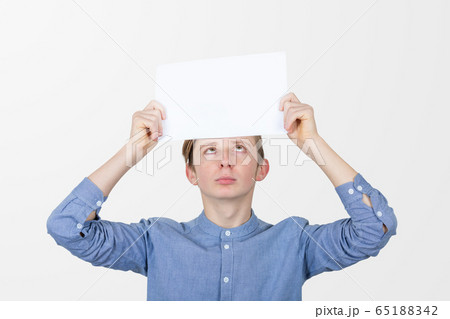Portrait of confused, thinking young boy seeks a 65188342