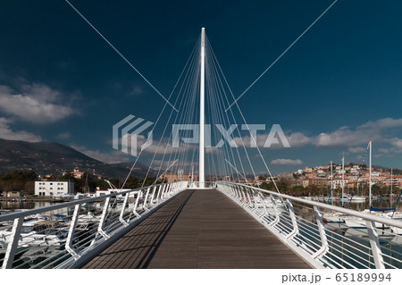 pedestrian white bridge in the Italian city of La Spezia on the Ligurian sea coast 65189994