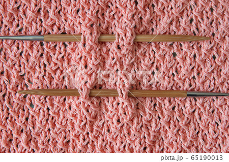 Coral cotton cardigan, crocheted close-up, wooden bamboo natural knitting needles 65190013