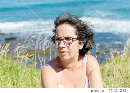 beautiful woman, on the background of blue sea 65194281
