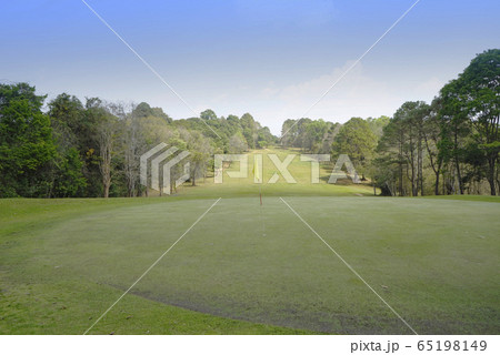 Beautiful golf course in a sunny day. Beautiful golf course in a sunny day. 65198149
