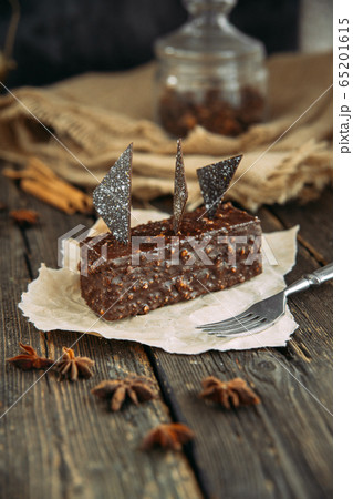 brownie on wooden table with fork. Country style brownie on wooden table with fork. Country style 65201615