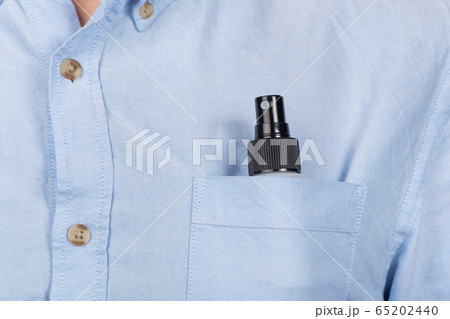 Compact spray in pocket of shirt. Antibacterial Compact spray in pocket of shirt. Antibacterial 65202440