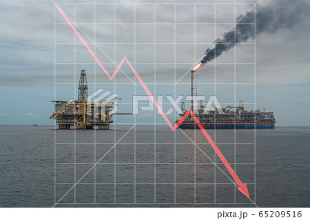 Concept of falling market in oil marine industry with with downward graphics. Oil price decreases. FPSO tanker vessel and Oil Rig platform Concept of falling market in oil marine industry with with downward graphics. Oil price decreases. FPSO tanker vessel and Oil Rig platform 65209516