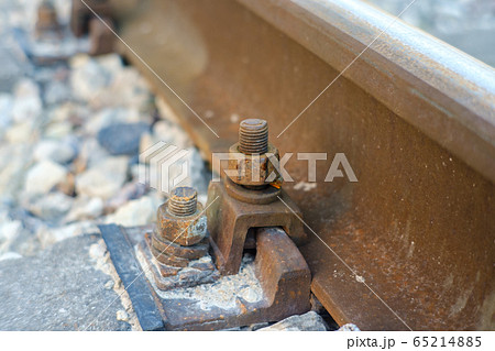 Closeup of screw mount of rails on the concrete 65214885