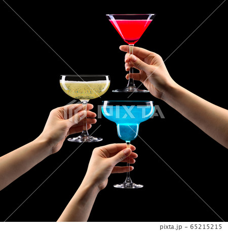 Set of hands holding cocktails isolated on black background Set of hands holding cocktails isolated on black background 65215215