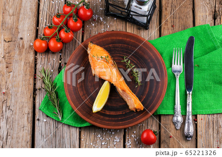 Plate with backed salmon steaks. Plate with backed salmon steaks. 65221326