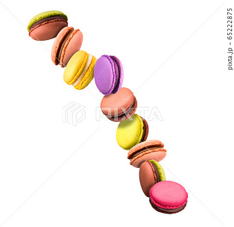 Set of flying french colorful macaroons isolated on white background Set of flying french colorful macaroons isolated on white background 65222875