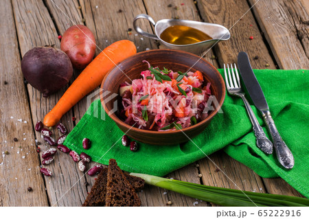 Beet salad Vinaigrette in a wooden bowl Beet salad Vinaigrette in a wooden bowl 65222916