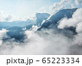 Photo of atmospheric blue misty mountains with 65223334