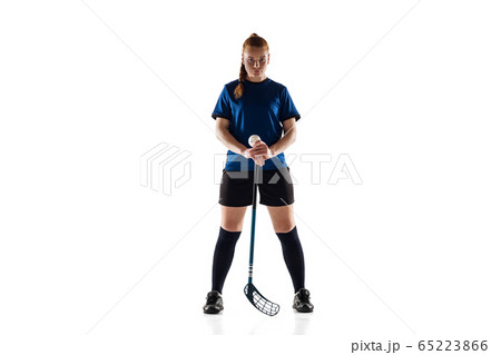 Floorball female player isolated on white studio background, action and motion concept 65223866