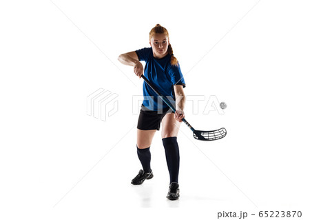Floorball female player isolated on white studio background, action and motion concept 65223870