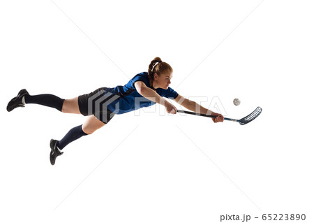 Floorball female player isolated on white studio background, action and motion concept 65223890