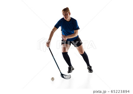 Floorball female player isolated on white studio background, action and motion concept 65223894