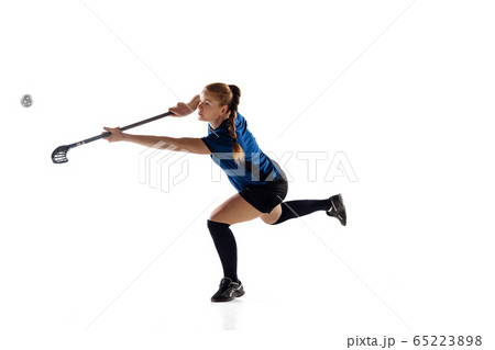 Floorball female player isolated on white studio background, action and motion concept 65223898