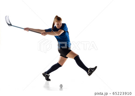 Floorball female player isolated on white studio background, action and motion concept 65223910