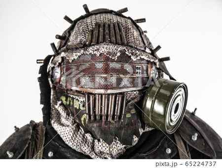 Portrait of post apocalyptic survivor in gas mask Portrait of post apocalyptic survivor in gas mask 65224737