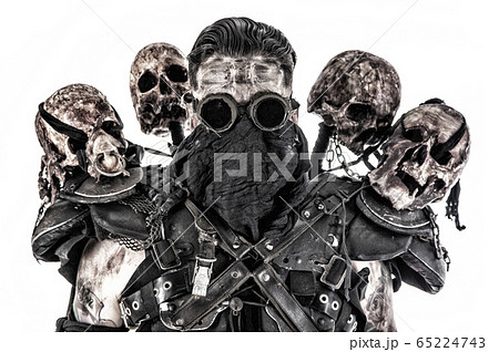 Post apocalyptic survivor with skulls 65224743
