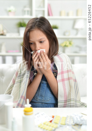 Close up portrait of sick little girl Close up portrait of sick little girl 65226452