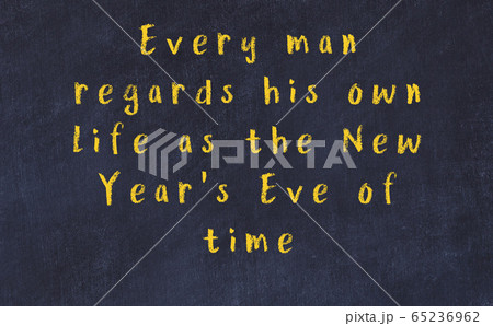 Chalk wise inscription on black chalkboard 65236962