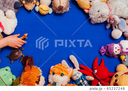 Lots of children's toys for child development games on a blue background Lots of children's toys for child development games on a blue background 65237248