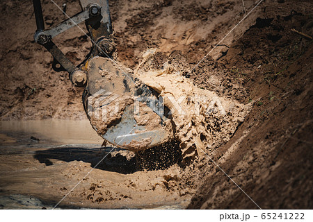 Digging the soil with large machinery Excavators 65241222