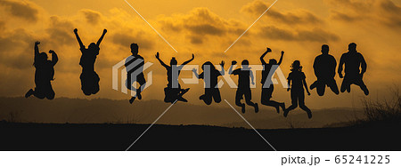 The black silhouette of a large group of people 65241225