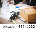 Businessman paying by credit card with a credit 65241232