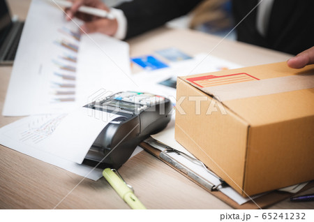 Businessman paying by credit card with a credit 65241232