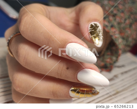 Amazing natural nails. Women's hands with clean Amazing natural nails. Women's hands with clean 65266213
