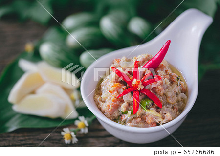 Crabs Roe in Coconut Chili Dip with vegetables on wood background 65266686
