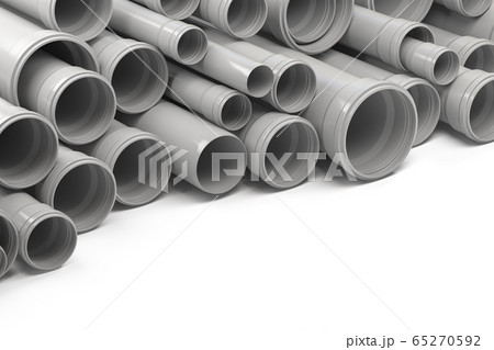 PVC plastic pipes and tubes stacked in warehouse. 65270592