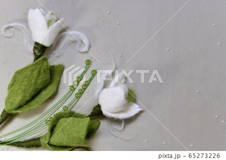 Two snowdrops made of wool on the left in the 65273226