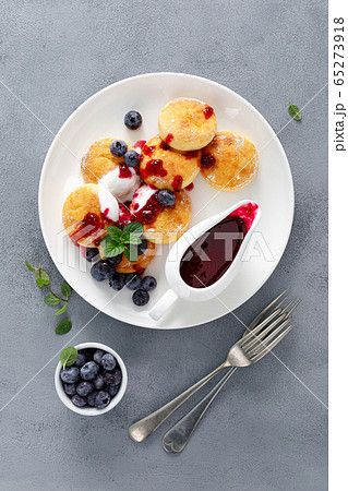 Baked cottage cheese pancakes, syrniki with Baked cottage cheese pancakes, syrniki with 65273918