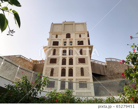 A tall stone square building, a tower 65279451