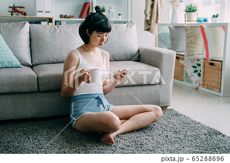 Attractive young asian japanese woman at home 65288696