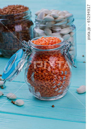 Glass can full of lentils peas. Glass can full of lentils peas. 65294917
