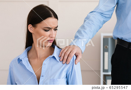 Boss Harassing Worker Woman Touching Her Shoulder At Workplace, Cropped Boss Harassing Worker Woman Touching Her Shoulder At Workplace, Cropped 65295547