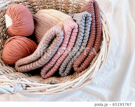 woolen knitted hats and balls of thread woolen knitted hats and balls of thread 65295767
