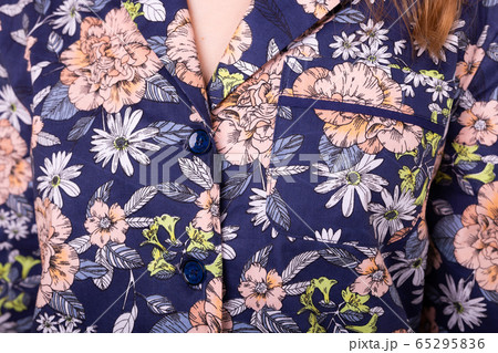 Close-up detail and fabric texture of a pajama. Home wear, sleepwear, shopping and sale concept. Close-up detail and fabric texture of a pajama. Home wear, sleepwear, shopping and sale concept. 65295836