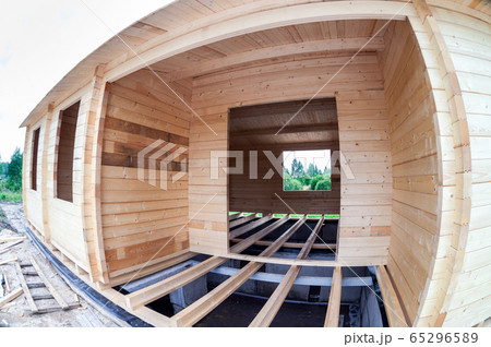 Construction of wooden house on the stone Construction of wooden house on the stone 65296589
