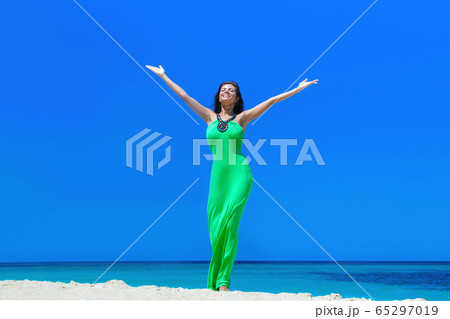 Woman enjoy vacation on beach 65297019